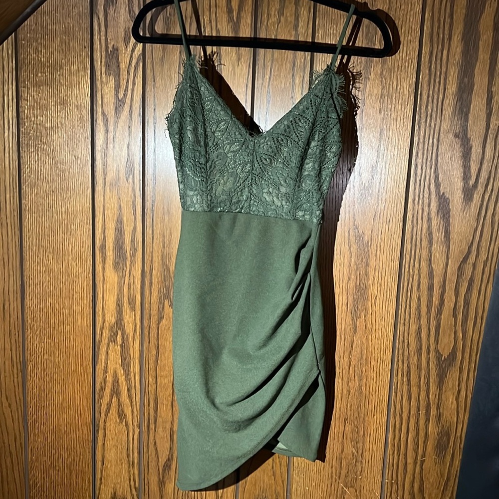 Green mini dress with lace design